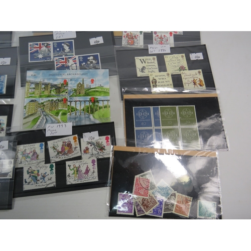 593 - Over 100 set of mainly mint stamps sets &  a large selection of unused postcards and Kensitas Cigare... 