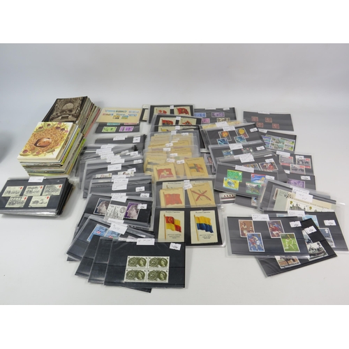 593 - Over 100 set of mainly mint stamps sets &  a large selection of unused postcards and Kensitas Cigare... 