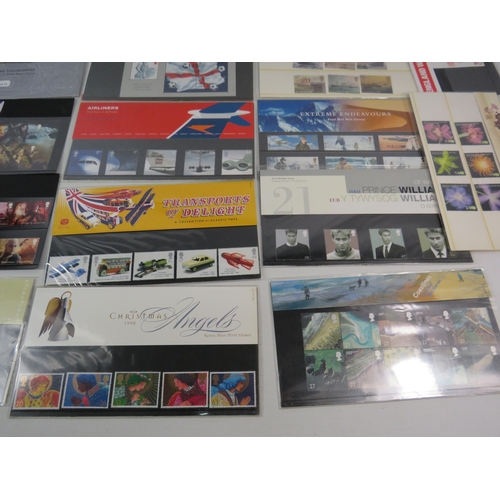 602 - 23 GB Mint stamp presentation packs.