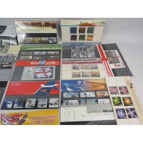 602 - 23 GB Mint stamp presentation packs.