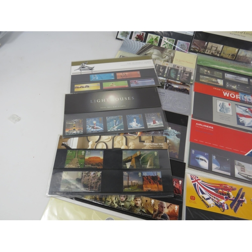 602 - 23 GB Mint stamp presentation packs.