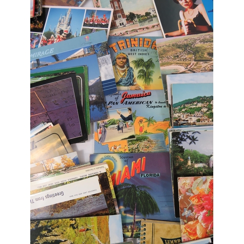 604 - Large selection of various vintage postcards.