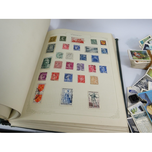 613 - Mixed lot to include a world stamp album, full Ogdens cigarette card album and a selection of loose ... 