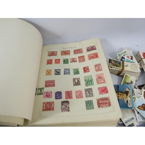 613 - Mixed lot to include a world stamp album, full Ogdens cigarette card album and a selection of loose ... 