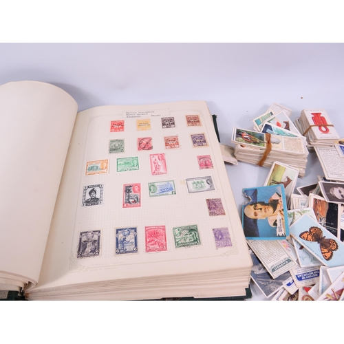 613 - Mixed lot to include a world stamp album, full Ogdens cigarette card album and a selection of loose ... 