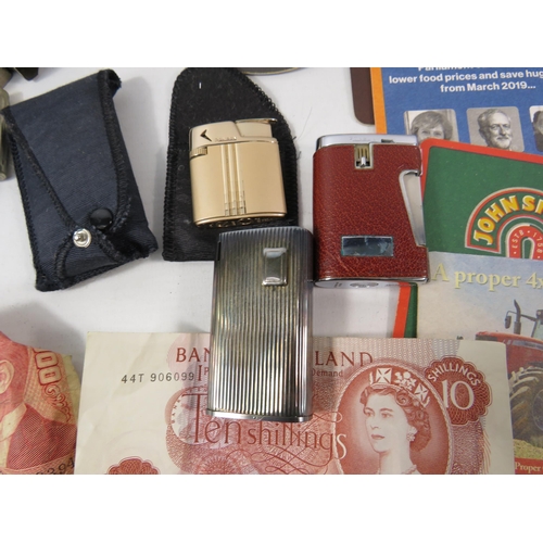 618 - Mixed lot to include three Ronson lighters, various vintage UK and foreign coins, beermats etc.