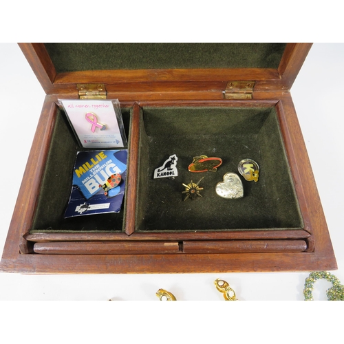 625 - Vintage wooden jewellery box with secret lock plus small selection of watches & pin badges.