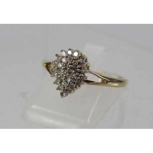 268a - 9ct Yellow Gold tear drop diamond cluster ring .25ct, size 0.5. 2.7 grams