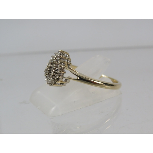 268a - 9ct Yellow Gold tear drop diamond cluster ring .25ct, size 0.5. 2.7 grams