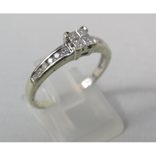 269a - 9ct White Gold Diamond ring, four main diamonds set in a square with six round diamonds on each shou... 