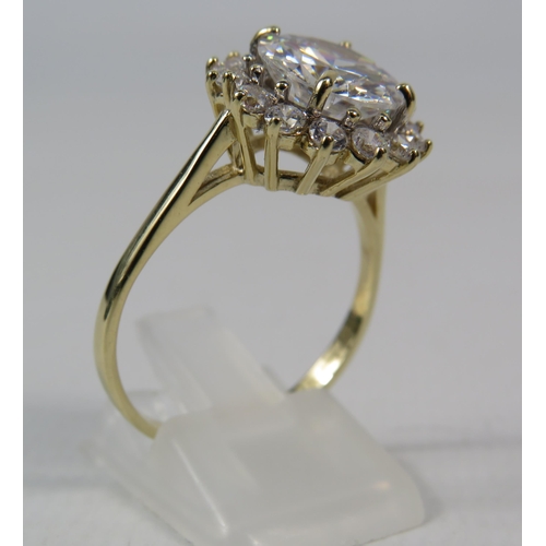 271a - 9ct Yellow Gold Ring set with one large 10mm and fourteen x 2mm Cubic Zirconia's in a flower pattern... 