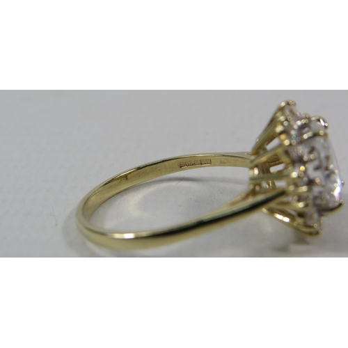 271a - 9ct Yellow Gold Ring set with one large 10mm and fourteen x 2mm Cubic Zirconia's in a flower pattern... 