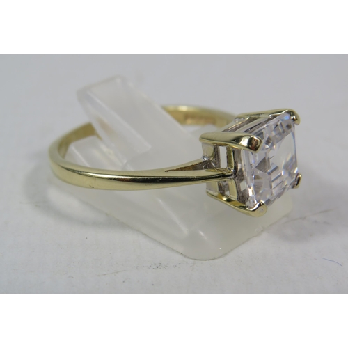 274a - 9ct Yellow Gold 8mm square Cubic Zirconia set ring, size T.5. 3.8grams.