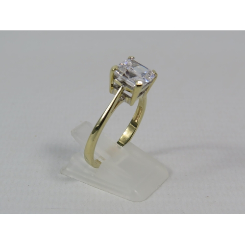 274a - 9ct Yellow Gold 8mm square Cubic Zirconia set ring, size T.5. 3.8grams.