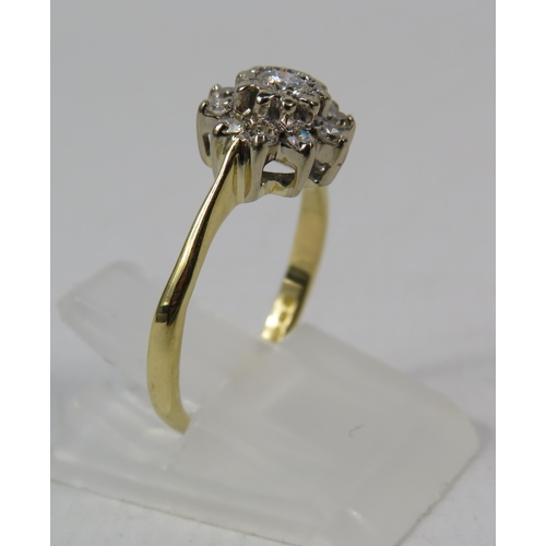 276a - 18ct Yellow Gold Diamond cluster ring, .10ct central diamond surrounded by Ten smaller diamonds. Fin... 