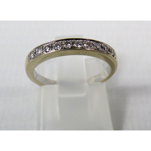 279a - 18ct White gold Diamond half eternity ring  set with Ten diamonds, .31ct, finger size I.5. 2.9 grams... 