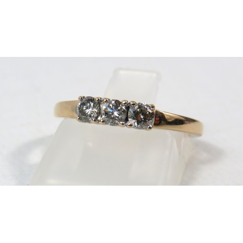 282a - 9ct Rose gold ring set with 3 diamonds, .37ct. Finger size L.5. 1.5 grams.