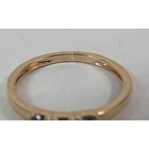 282a - 9ct Rose gold ring set with 3 diamonds, .37ct. Finger size L.5. 1.5 grams.