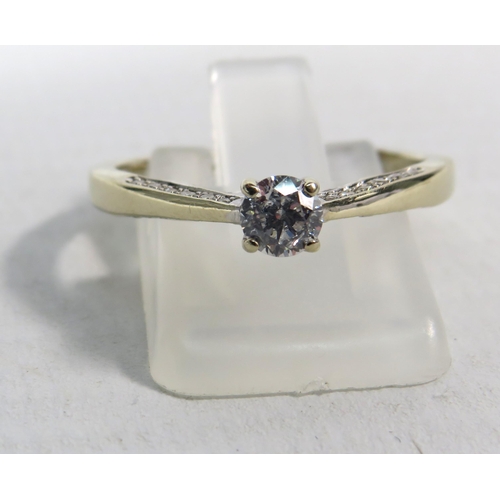 284a - 18ct White gold .40ct diamond solitaire ring with Accents to the inner shoulders, finger size R. 3.3... 