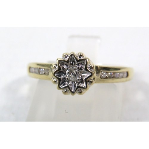 287a - 9ct Yellow gold 15pt diamond ring, Central diamond set within a star illusion and Five diamonds to e... 