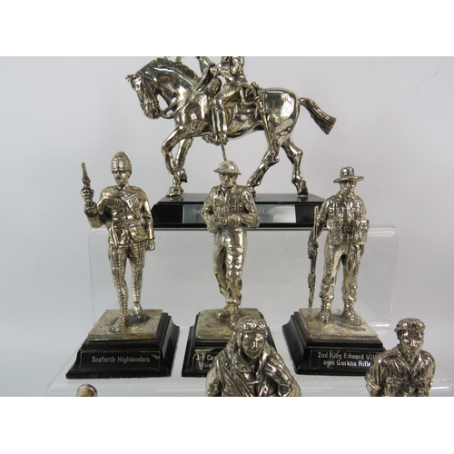 633 - Seven Royal Hampshire white metal figurines of Soldiers, various Regiments. The tallest stands 6