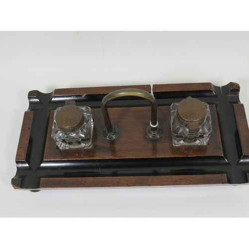 823 - Darkwood desk set with original brass topped glass inkwells in excellent condition. Measures approx ... 