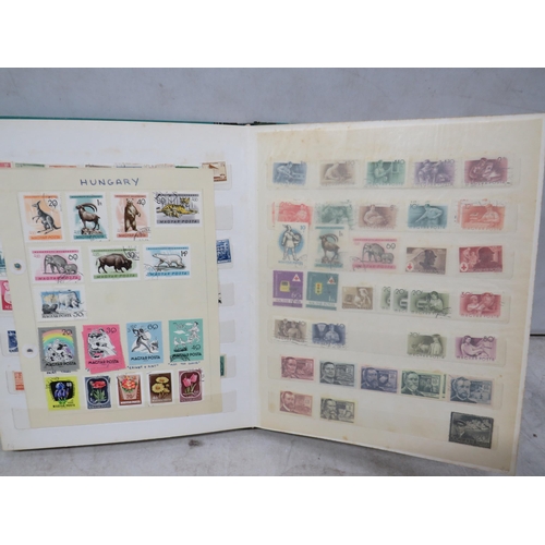 829 - Good Selection of part filled stamp albums containing world stamps.  See photos