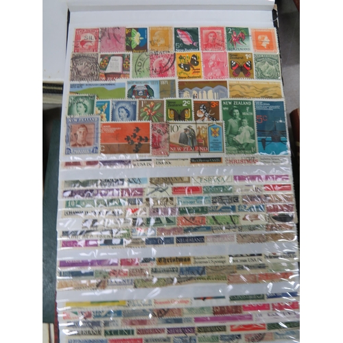 830 - Good Selection of part filled stamp albums containing world stamps.  See photos