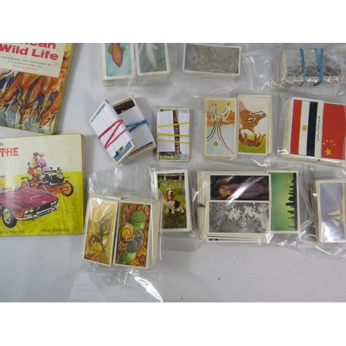 646 - Cigarette cards loose and in albums plus a part filled vintage cigarette pictures album.