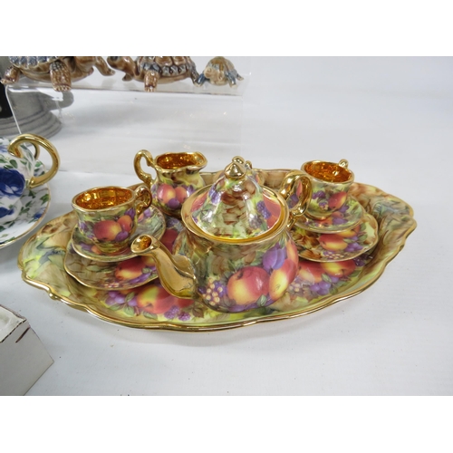 649 - Mixed lot including two miniature teaset, Glass stag beetle, Wade etc.