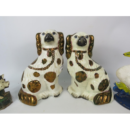 676 - A Pair of antique porcelain Staffordshire dogs with copper lustre spots, a cast iron letter rack and... 