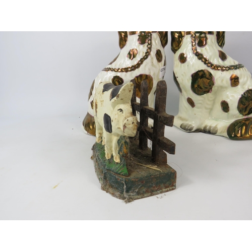 676 - A Pair of antique porcelain Staffordshire dogs with copper lustre spots, a cast iron letter rack and... 