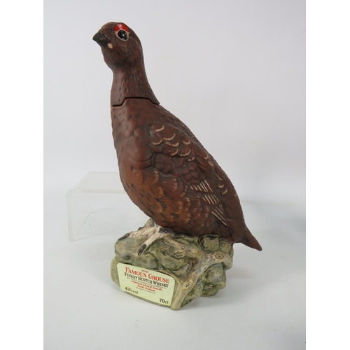 688 - Royal Doulton Famous Grouse Bird whiskey decanter plus a Hungarian figurine of a lady sat in a chair... 