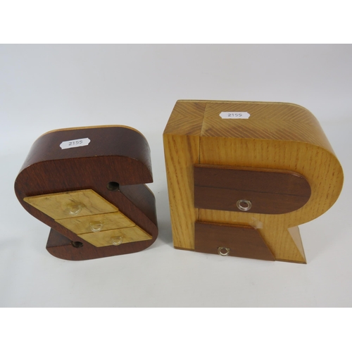 693 - Two wooden ring boxes in the form of letters R & S. The tallest measures 6.5