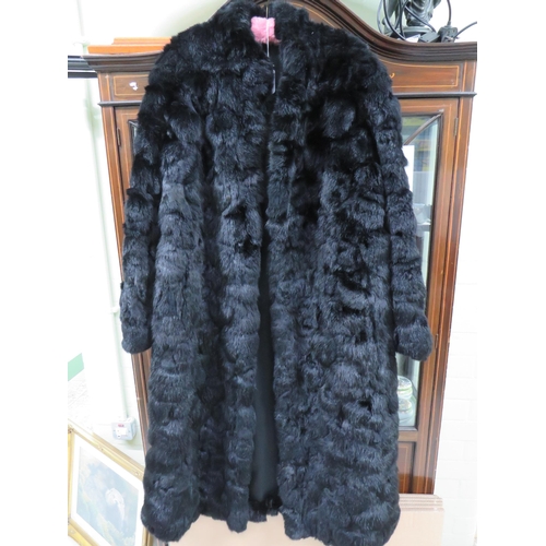 752 - Genuine Fur Coat in good condition UK size Large.  See photos