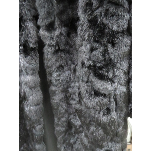 752 - Genuine Fur Coat in good condition UK size Large.  See photos