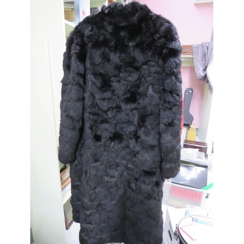 752 - Genuine Fur Coat in good condition UK size Large.  See photos