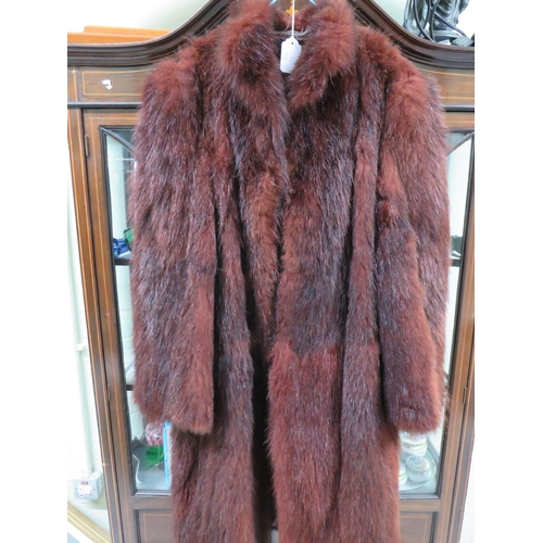 753 - Ladies Faux fur coat with nylon lining in fair condition. No lable but estimated size UK Large. See ... 