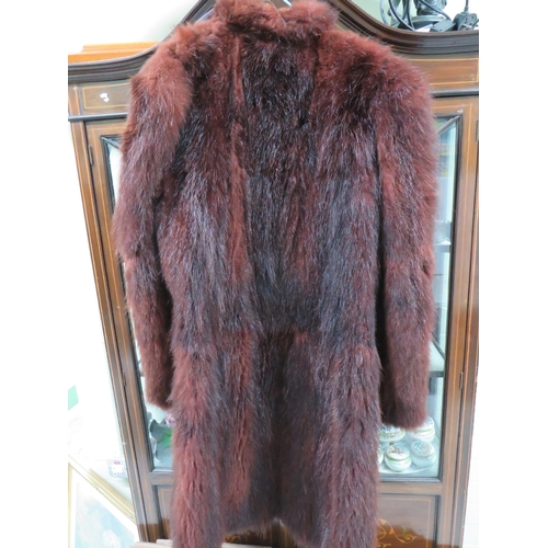 753 - Ladies Faux fur coat with nylon lining in fair condition. No lable but estimated size UK Large. See ... 