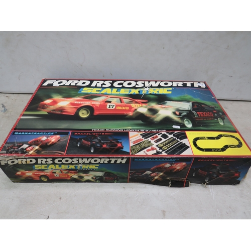 762 - Scalextric Ford RS Cosworth Road Racing Set which appears to be complete. Box complete but in slight... 