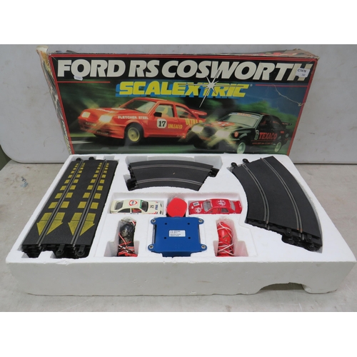 762 - Scalextric Ford RS Cosworth Road Racing Set which appears to be complete. Box complete but in slight... 