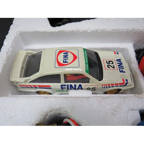 762 - Scalextric Ford RS Cosworth Road Racing Set which appears to be complete. Box complete but in slight... 