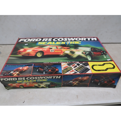 763 - Scalextric Ford RS Cosworth Road Racing Set which appears to be complete. Box complete but in slight... 