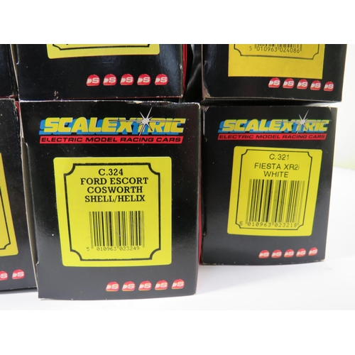 764 - 13 Scalextric Model Racing cars, All in unused condition with boxes, (two boxes are crushed and tatt... 