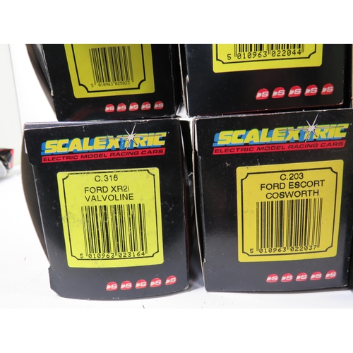 764 - 13 Scalextric Model Racing cars, All in unused condition with boxes, (two boxes are crushed and tatt... 