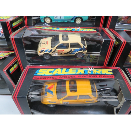 764 - 13 Scalextric Model Racing cars, All in unused condition with boxes, (two boxes are crushed and tatt... 