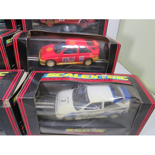 764 - 13 Scalextric Model Racing cars, All in unused condition with boxes, (two boxes are crushed and tatt... 