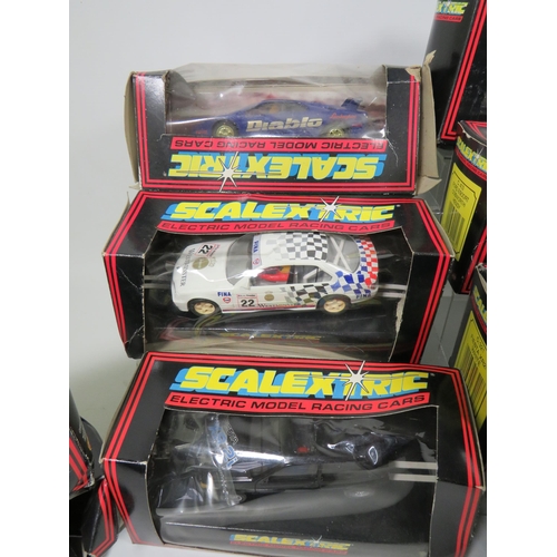 764 - 13 Scalextric Model Racing cars, All in unused condition with boxes, (two boxes are crushed and tatt... 