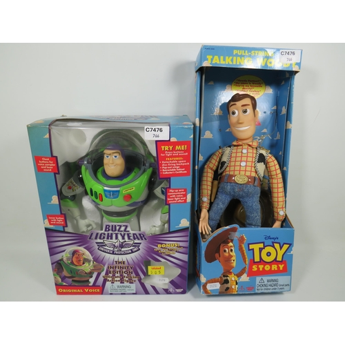 766 - Two Disney Toy Story Figures, Buzz Lightyear and Woody. Both have original boxes and appear to be in... 