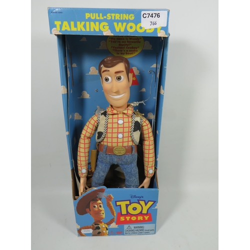 766 - Two Disney Toy Story Figures, Buzz Lightyear and Woody. Both have original boxes and appear to be in... 